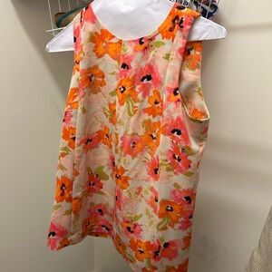 Loft flowered sleeveless blouse. Invisible snap closure in back